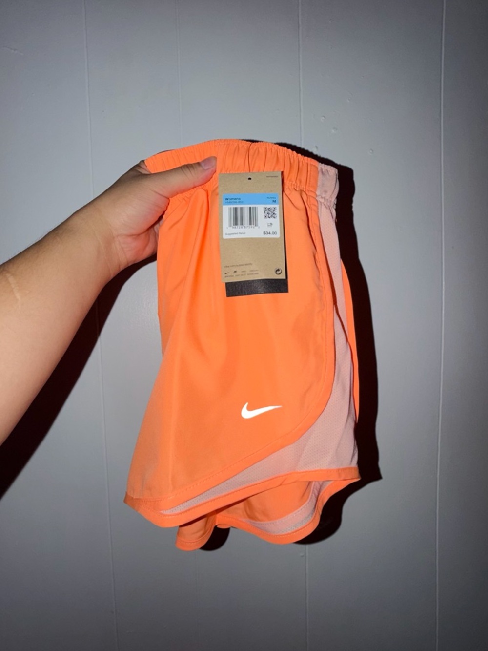 Nike Orange Athletic Running Shorts with Pink Mesh Trim